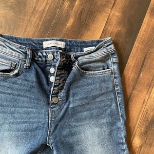 Flying monkey button fly jeans raw edge